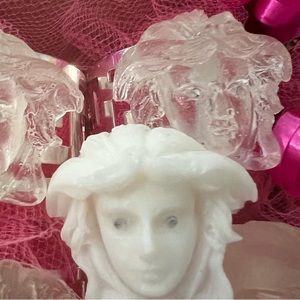 Set of 8 napkin, rings, silver Greek band with clear face rhinestones in eyes.